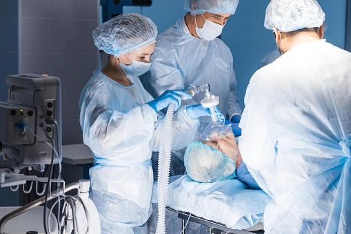 A group of doctors performing surgery in a hospital